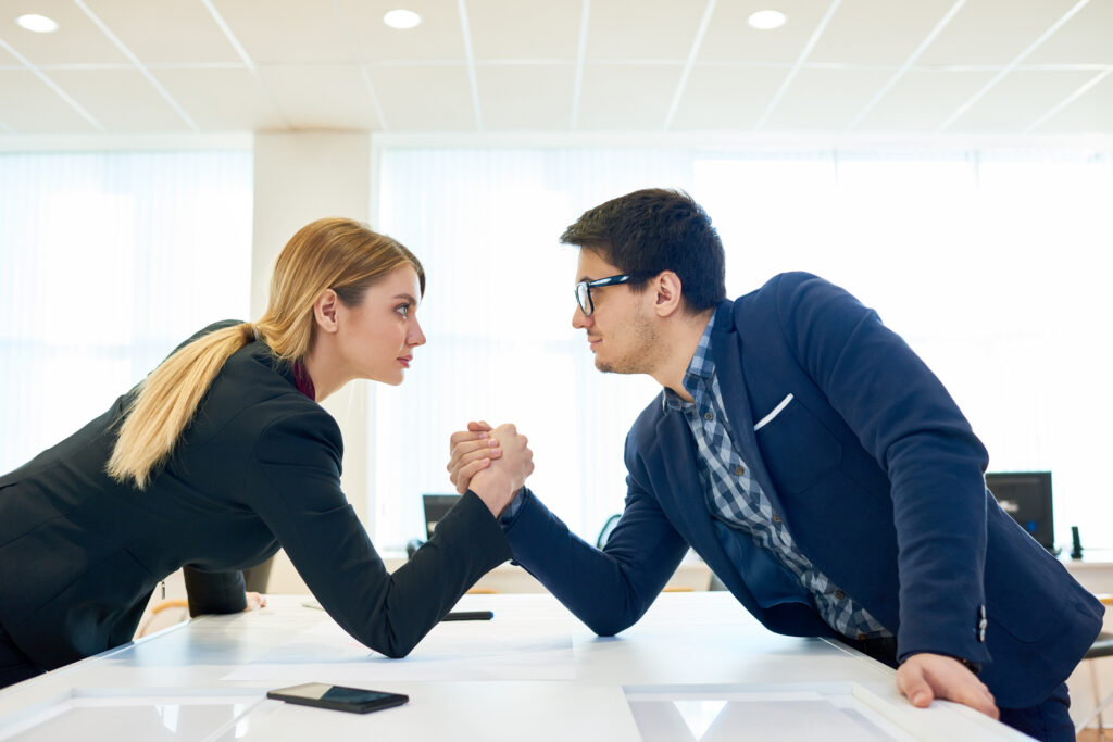 Two people trying to develop as professionals despite differences
