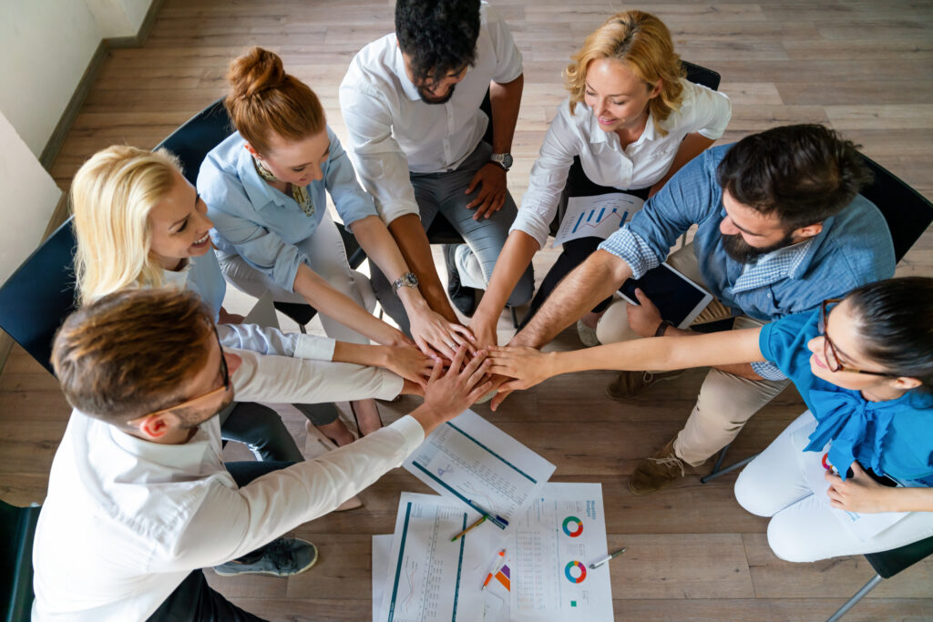 A group of people formulating better teamwork strategies